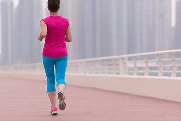 Image showing woman running on the promenade