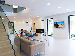 Image showing young happy couple relaxes in the living room