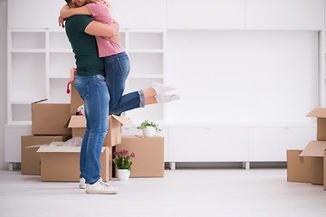 Image showing happy Young couple moving in new house