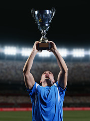 Image showing soccer players celebrating victory