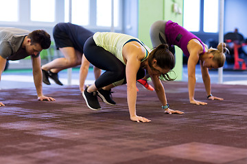 Image showing group of people exercising in gym