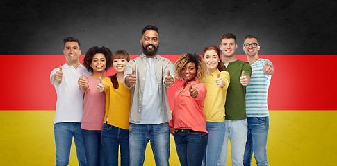 Image showing international group of people showing thumbs up