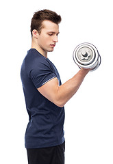 Image showing sportive young man with dumbbell