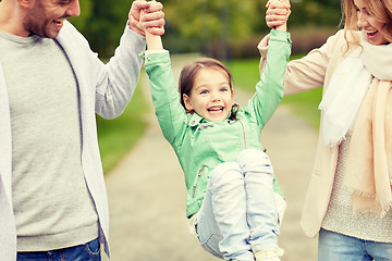 Image showing happy family walking in summer park and having fun