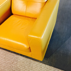 Image showing Bright yellow leather armchair