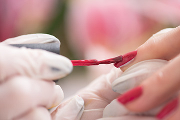 Image showing Woman hands receiving a manicure