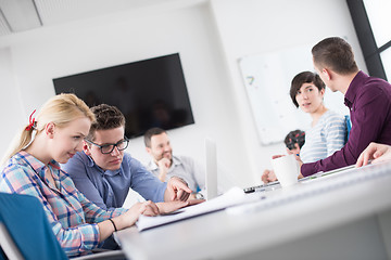 Image showing Two Business People Working With laptop in office