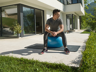 Image showing man doing morning yoga exercises