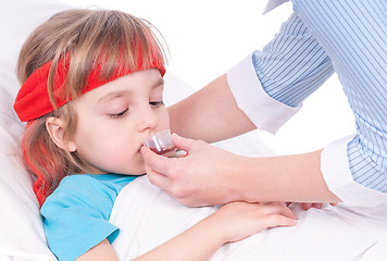 Image showing Sick little girl in bed