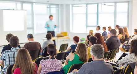 Image showing Speaker giving presentation on business conference.