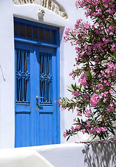 Image showing greek island ancient building door with flowers