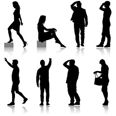 Image showing Set Black silhouettes of beautiful man and woman on white background. illustration