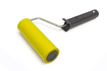 Image showing Yellow rubber paint roller on a white background