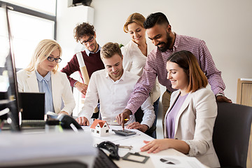 Image showing business team discussing house project at office