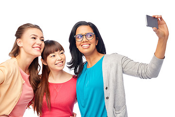 Image showing international group of happy women taking selfie