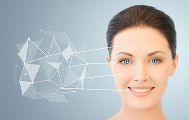 Image showing woman face with low poly projection and pointers