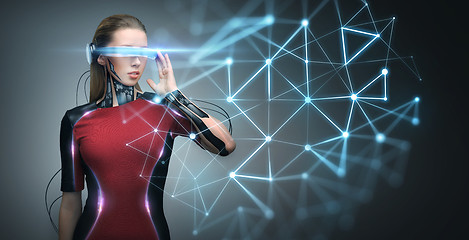 Image showing woman in virtual reality glasses and microchip