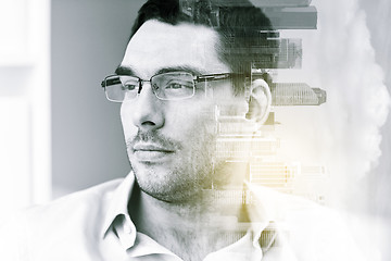 Image showing portrait of businessman in eyeglasses at office