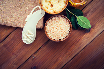 Image showing close up of himalayan salt with brush and towel