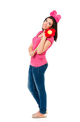 Image showing Teen girl with big flower