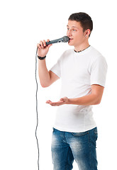 Image showing Young man with microphone