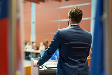 Image showing Public speaker giving talk at Business Event.