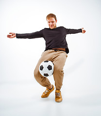 Image showing The portrait of fan with ball on gray background