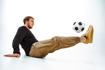 Image showing The portrait of fan with ball on gray background