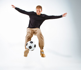 Image showing The portrait of fan with ball on gray background