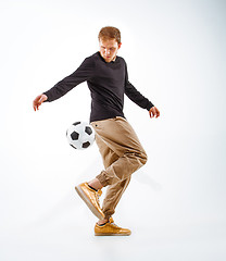 Image showing The portrait of fan with ball on gray background