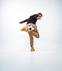 Image showing The portrait of fan with ball on gray background