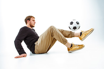 Image showing The portrait of fan with ball on gray background