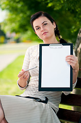 Image showing Business woman in summer park