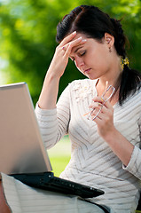 Image showing Business woman in summer park