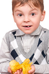 Image showing Little boy with packet potato chips