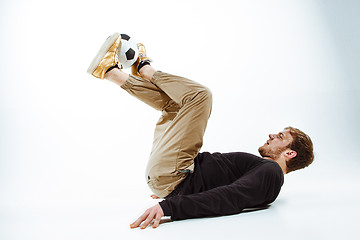 Image showing The portrait of fan with ball on gray background