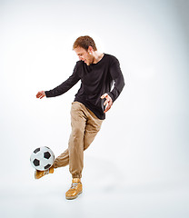 Image showing The portrait of fan with ball on gray background