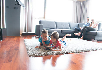 Image showing couple spending time with kids