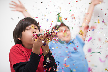 Image showing kids  blowing confetti