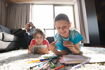 Image showing young couple spending time with kids