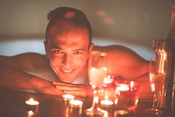 Image showing man relaxing in the jacuzzi