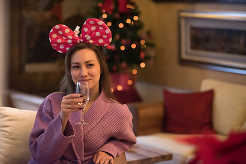 Image showing woman drinking champagne at spa