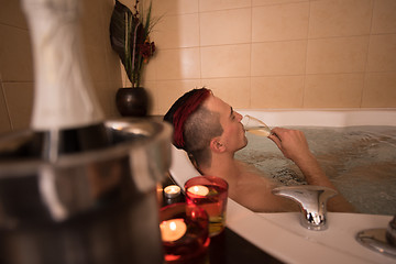 Image showing man relaxing in the jacuzzi