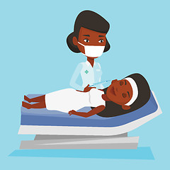 Image showing Woman receiving beauty facial injections in salon.
