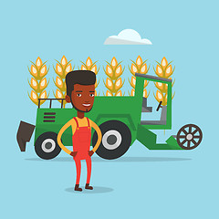 Image showing Farmer standing with combine on background.