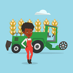 Image showing Farmer standing with combine on background.