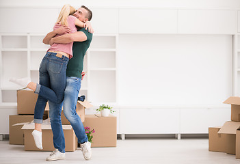 Image showing happy Young couple moving in new house