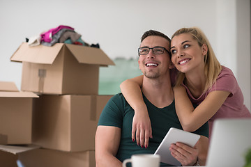 Image showing Young couple moving in a new home