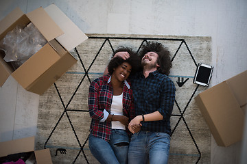 Image showing Top view of attractive young multiethnic couple