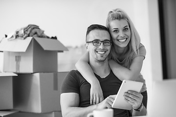 Image showing Young couple moving in a new home